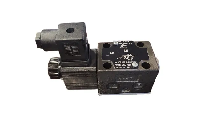 X-Trac Power Unit solenoid valve assembly, including solenoid coil and electrical connector.